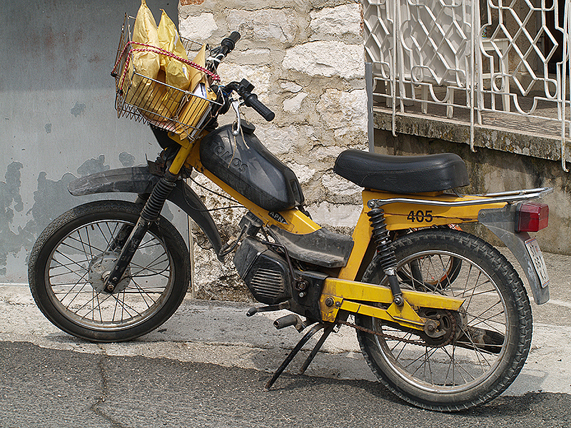 Tomos delivering mail